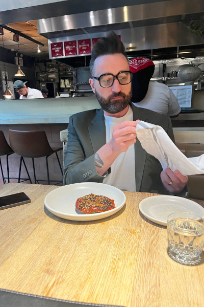 Josh sitting at the table