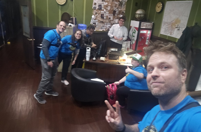 Selfie of the group inside an escape room