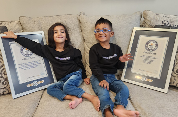prem twins with their GWR certificates