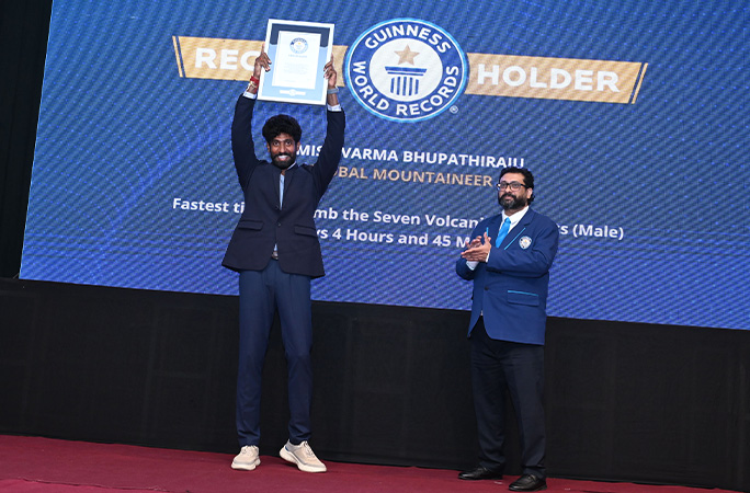 Anmish holding up his GWR certificate