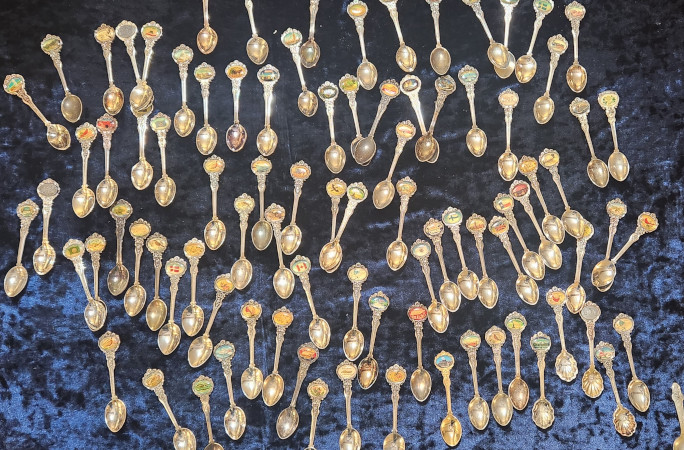 Spoons atop blue velvet