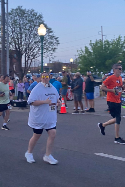 Meredith running mid race