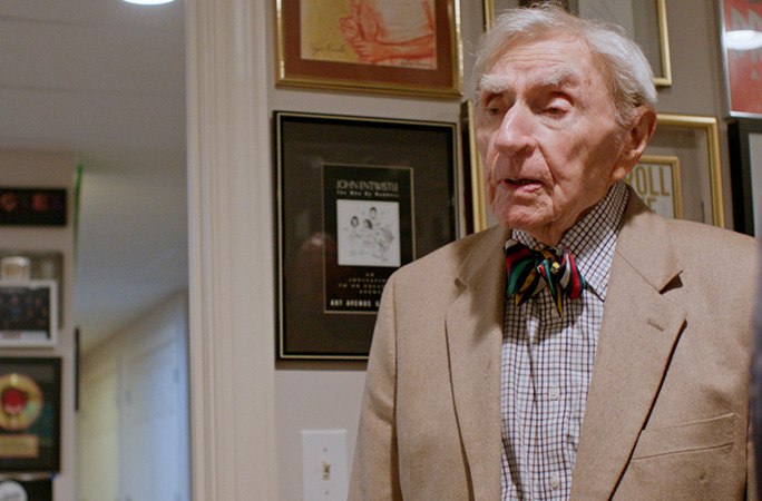 Dr Howard wearing a suit