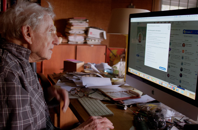 Dr Howard working at a computer