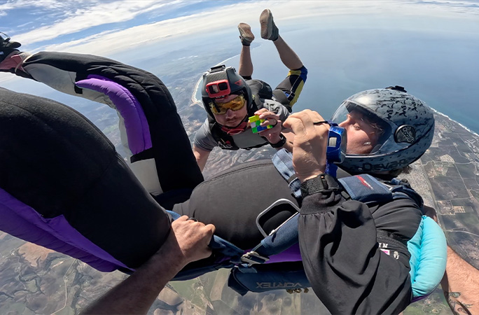 Tom solving the cube in freefall