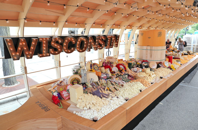 Wisconsin sign in front of the cheese platter