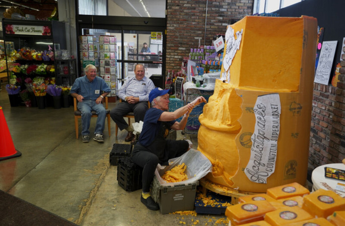 Carving the cheddar, horizontal view