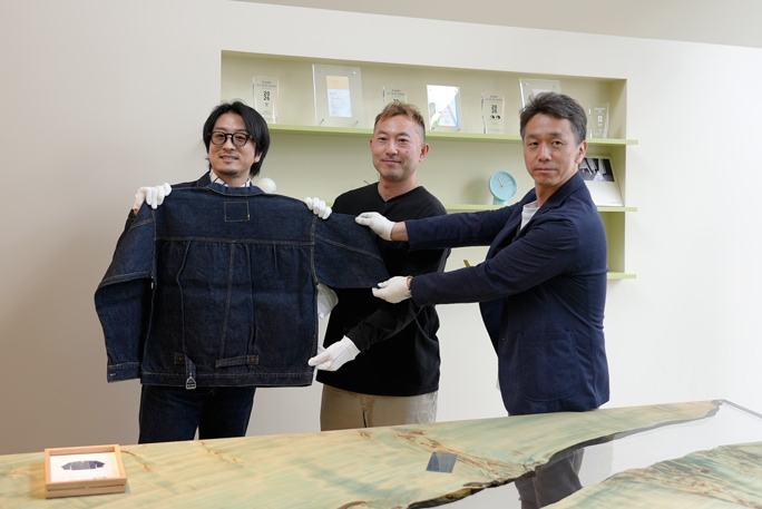 Handover of the most expensive denim jacket from the seller