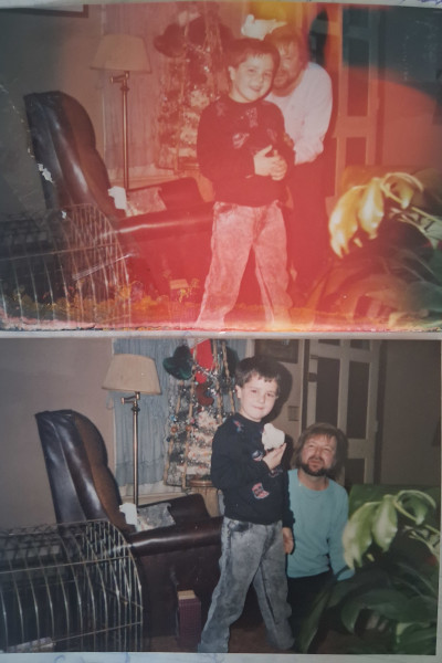 Vertical shot of Dewayne and a boy with the doves when they were younger