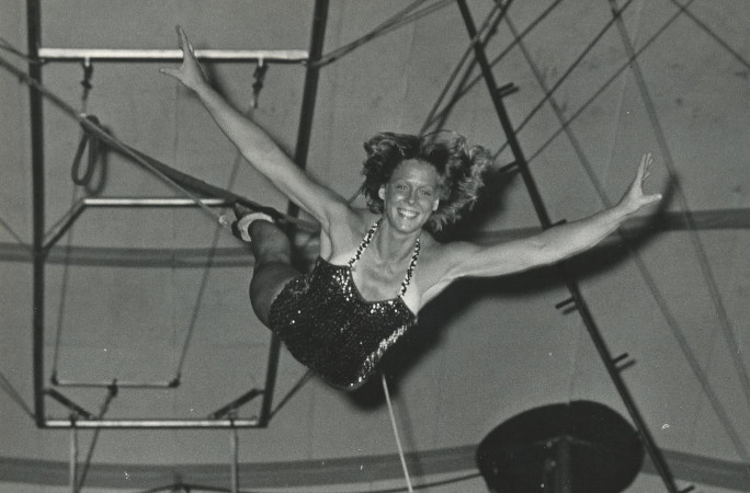 Close up of Linda on the trapeze when she was younger