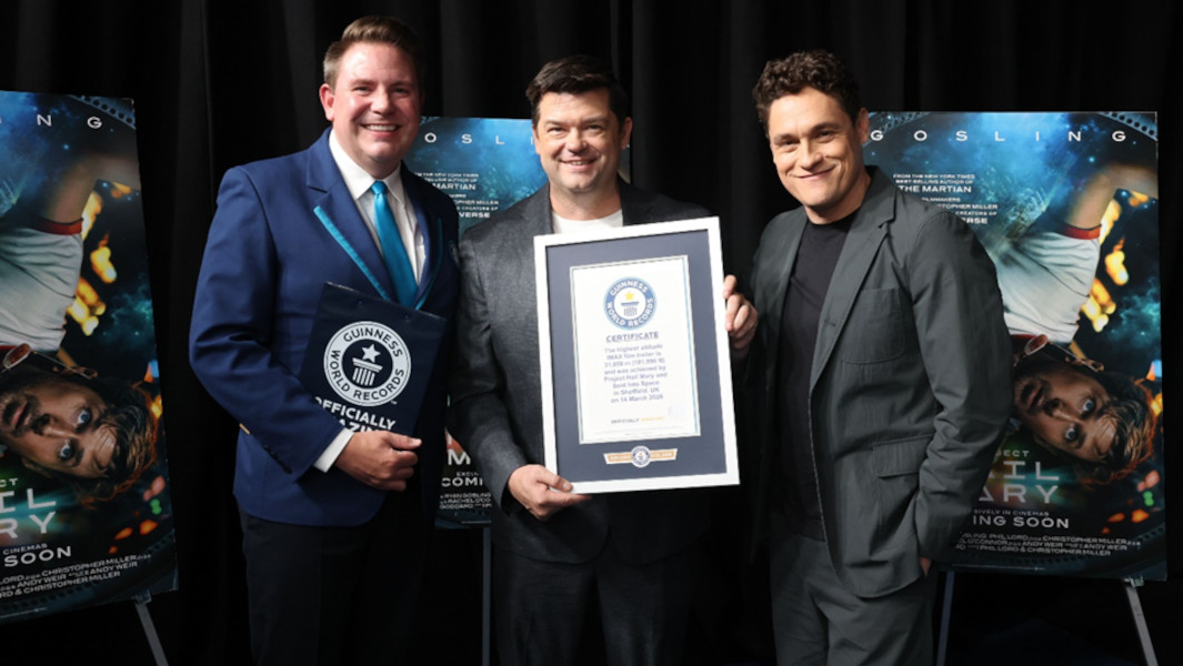 GWR Adjudicator posing with Project Hail Mary directors and their GWR certificate