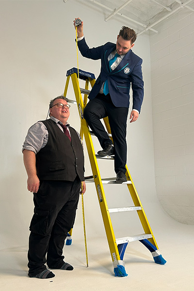GWR Adjudicator Will Munford practising his measuring technique on colleague Craig