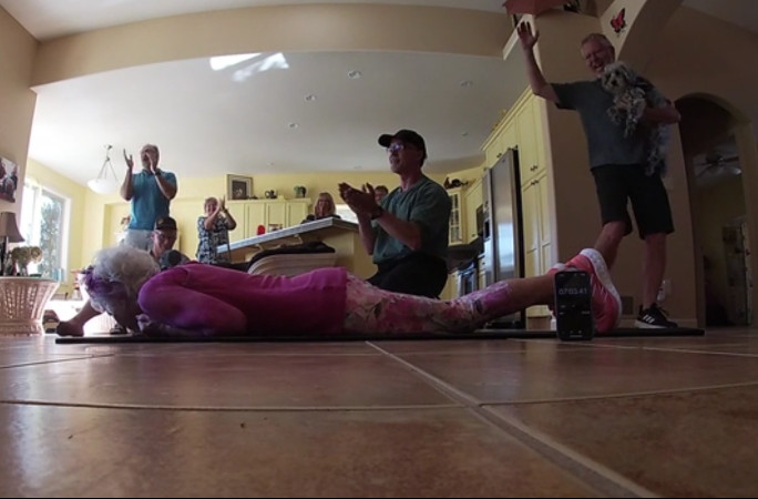 Everyone celebrating Suzannah's record, even a dog!