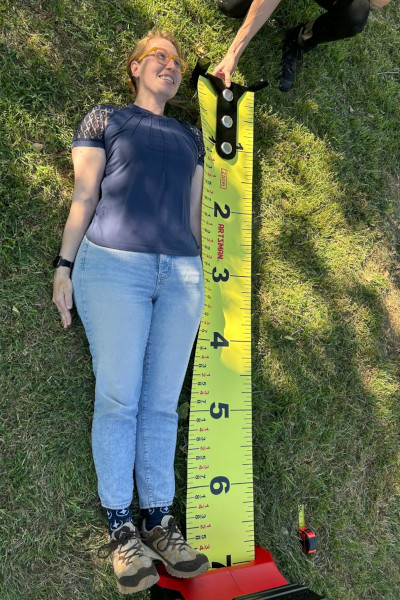 Tape measure measuring a person