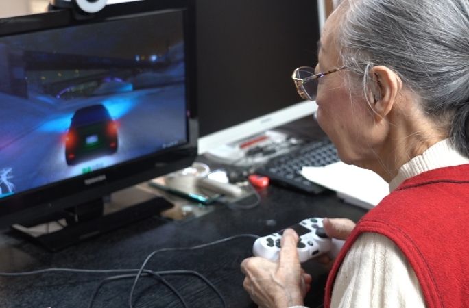 A Japanese woman playing video games