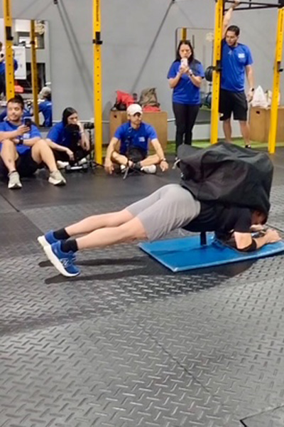 Fernando planking with a crowd watching