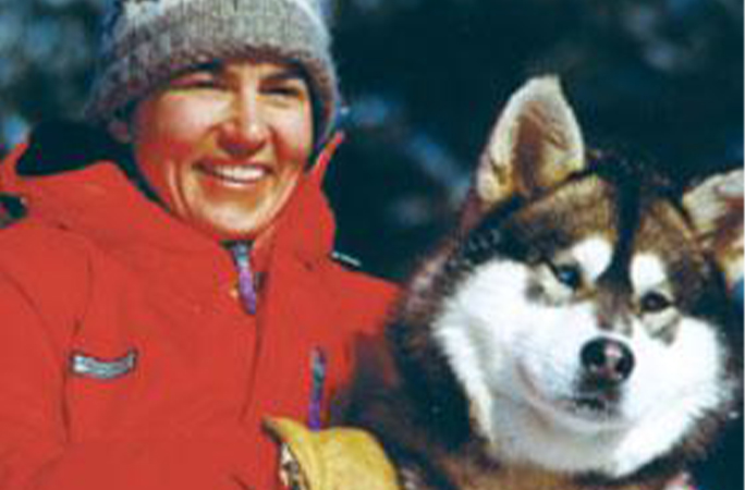 Ann with a sled dog