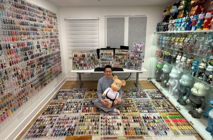 Daniel surrounded by his Bearbricks