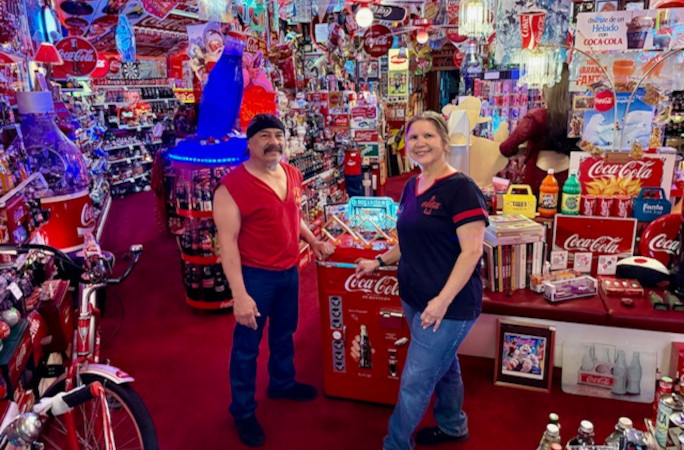 Bardo and Olga posing in the Coca-Cola room