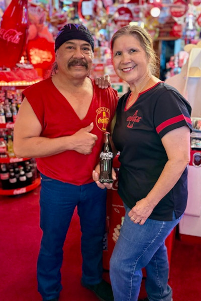 Closeup on Bardo and Olga with a Coke bottle