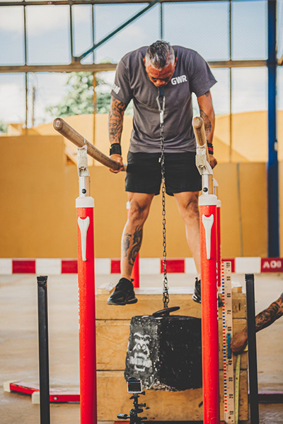 Egmond lifting weight with his mouth