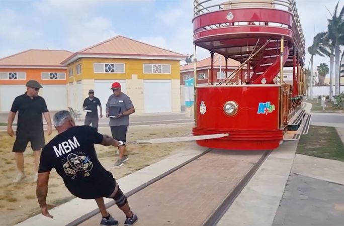Egmond pulling a tram with one finger