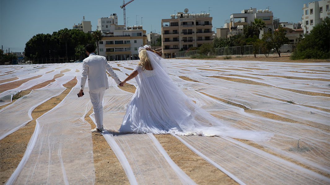 split image of the longest wedding veil and most flower girls