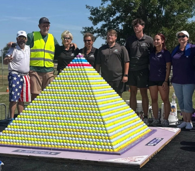 Group photo next to the finished pyramid