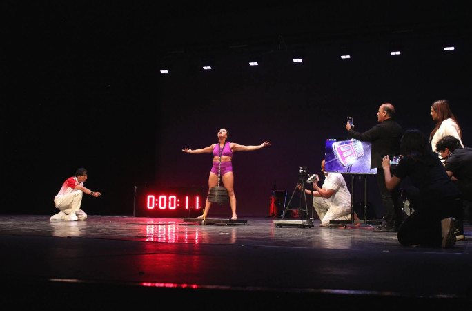 Zoomed out view of Diana onstage during the attempt