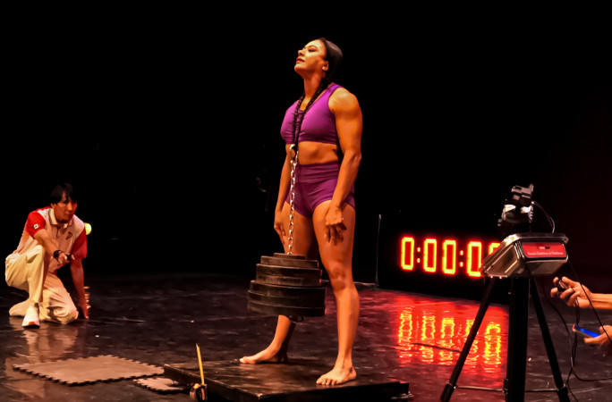 Side view of Diana lifting the weight during her attempt