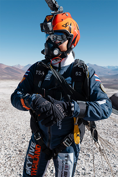 Super Toom dressed in his gear standing on the ground