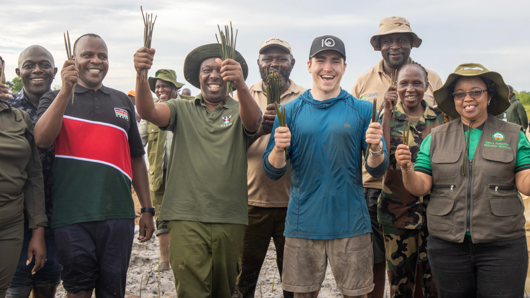 Split header of the Kenyan team celebrating with Antoine, and Antoine smiling while planting