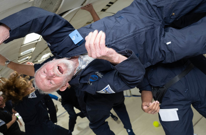 Robert smiling while floating 