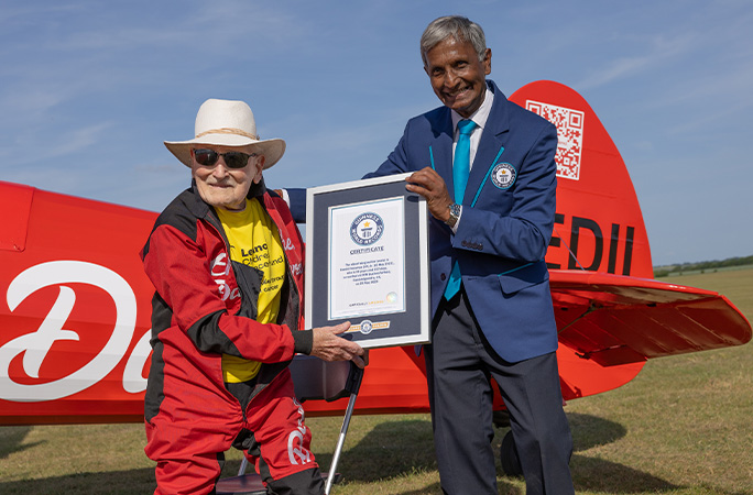 GWR's Pravin Patel presenting Harry with his certificate