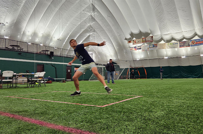 Dillon Ruble throwing a paper plane