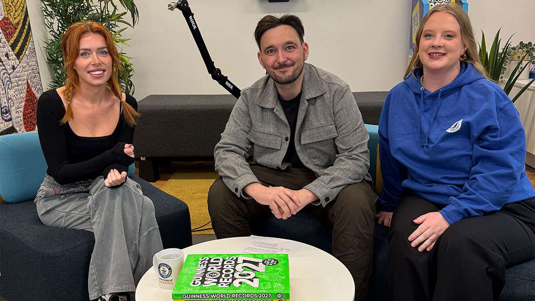 Holly Murray with GWR's Will Munford and Emma Salt and holding up her latex mask