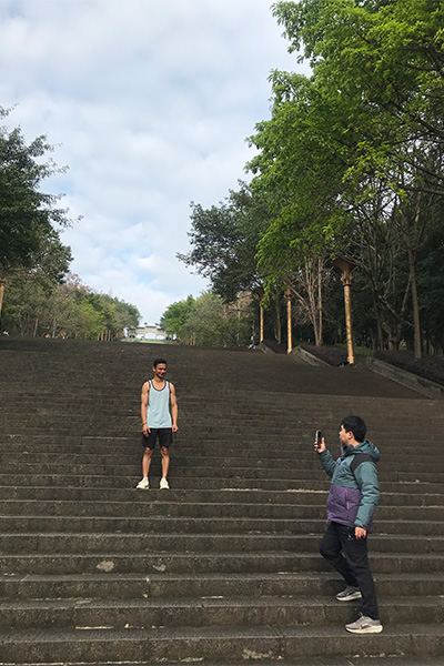 Hari standing on the stairs