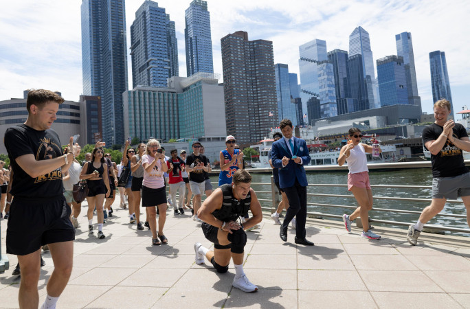 Austin surrounded by a crowd in the middle of his attempt