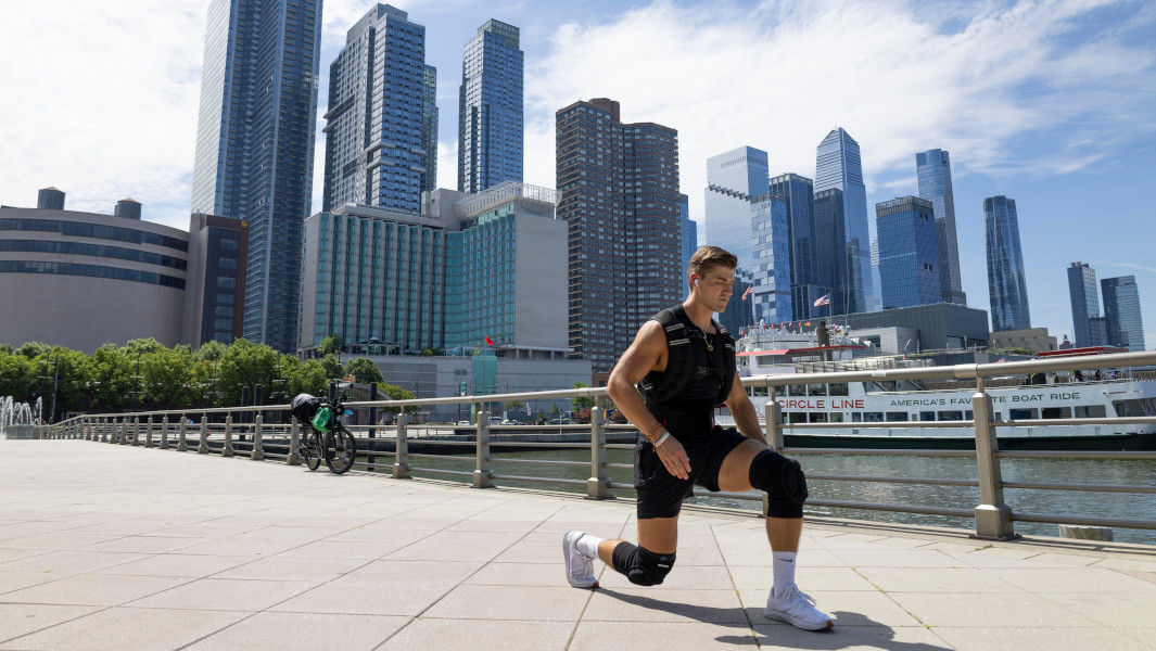 Austin lunging in front of the Manhattan skyline
