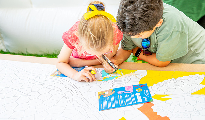 children colouring the artwork