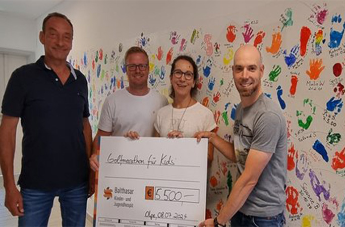 presenting the cheque to the hospice