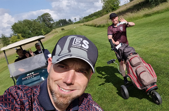 Tim and Marco with a golf buddy