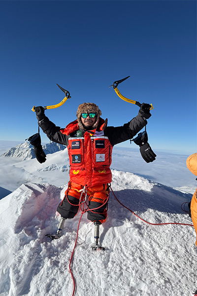 Hari on top of Vinson