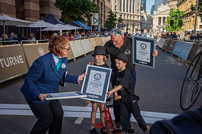 largest-and-smallest-penny-farthing-riders-receive-their-gwr-certificates-from-adjudicator-juliet-dawson