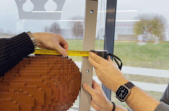 lego sausage being measured