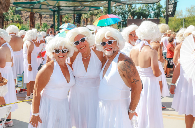 Three Marilyns posing for a pic in matching sunglasses