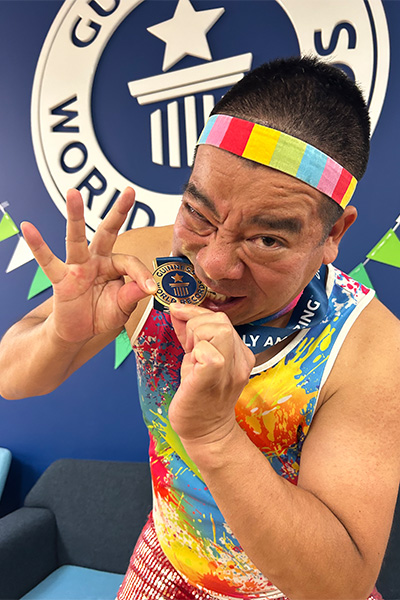 Mr Cherry biting a GWR medal