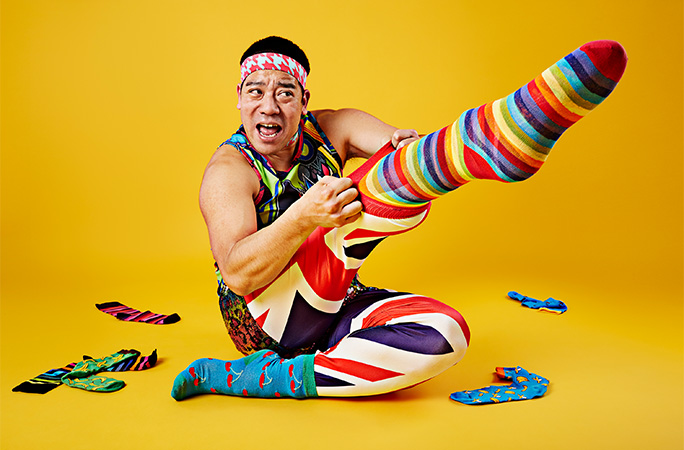 Mr Cherry pulling socks on