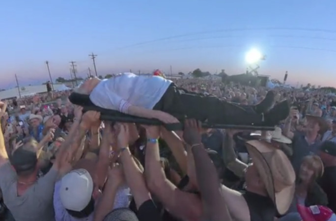 Side view of Pauline being carried