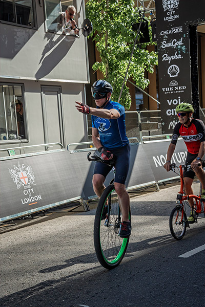 roger-davies-riding-a-unicycle-while-blindfolded